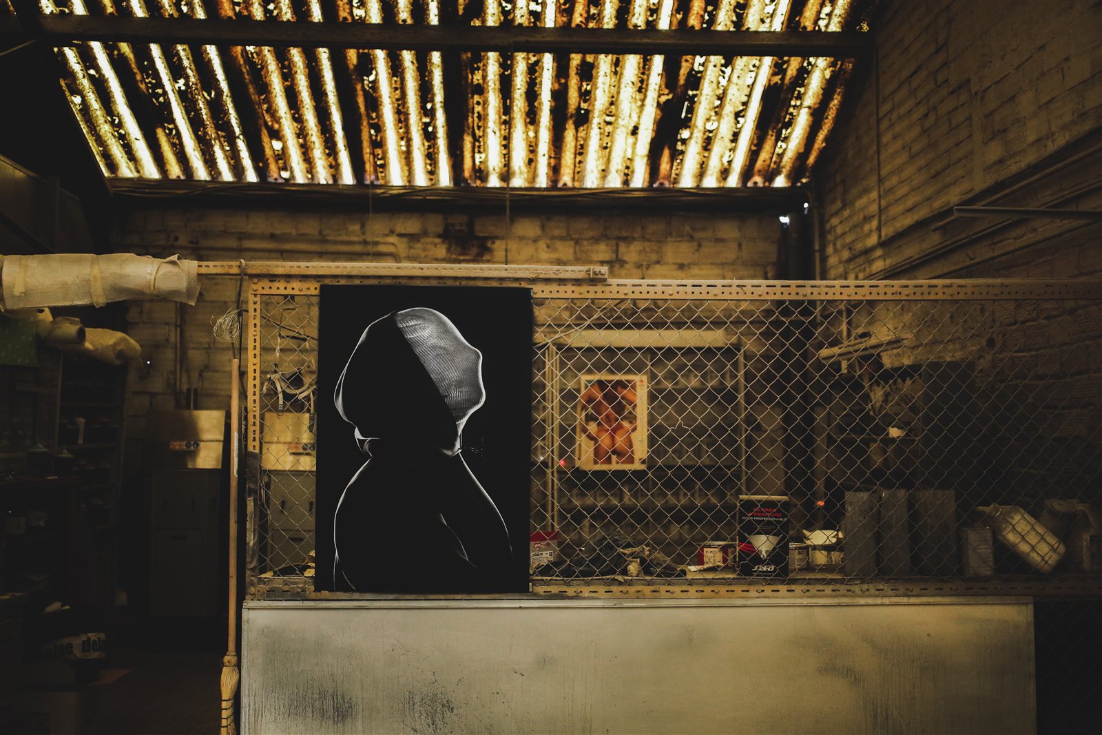 HEYMES poster 001, hooded figure